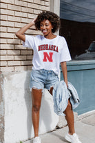 NEBRASKA CORNHUSKERS AROUND WE GO SHORT SLEEVE FLOWY TEE