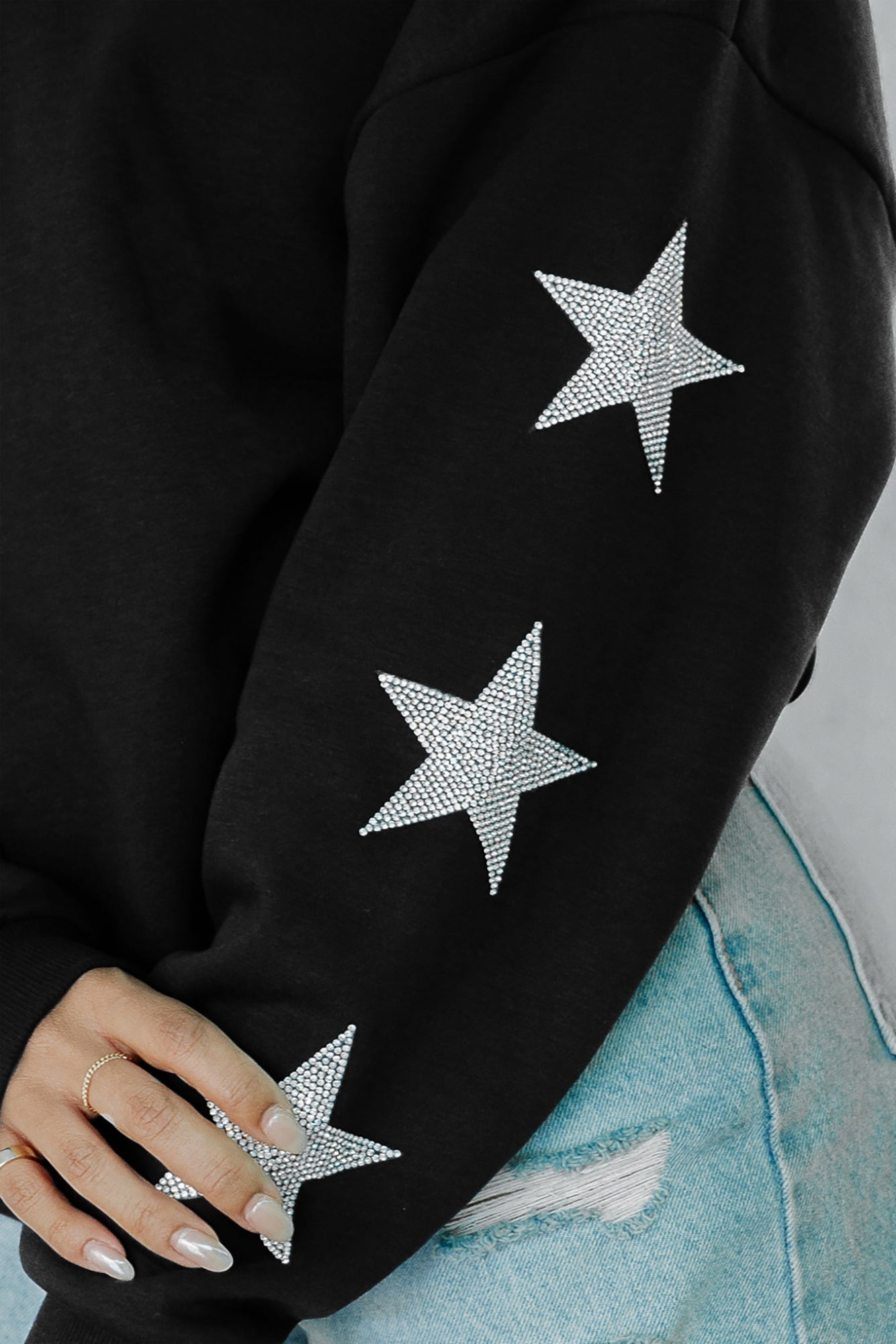 BUFFALO BILLS RADIANT ENERGY EMBELLISHED STAR SLEEVE CREWNECK PULLOVER IN BLACK