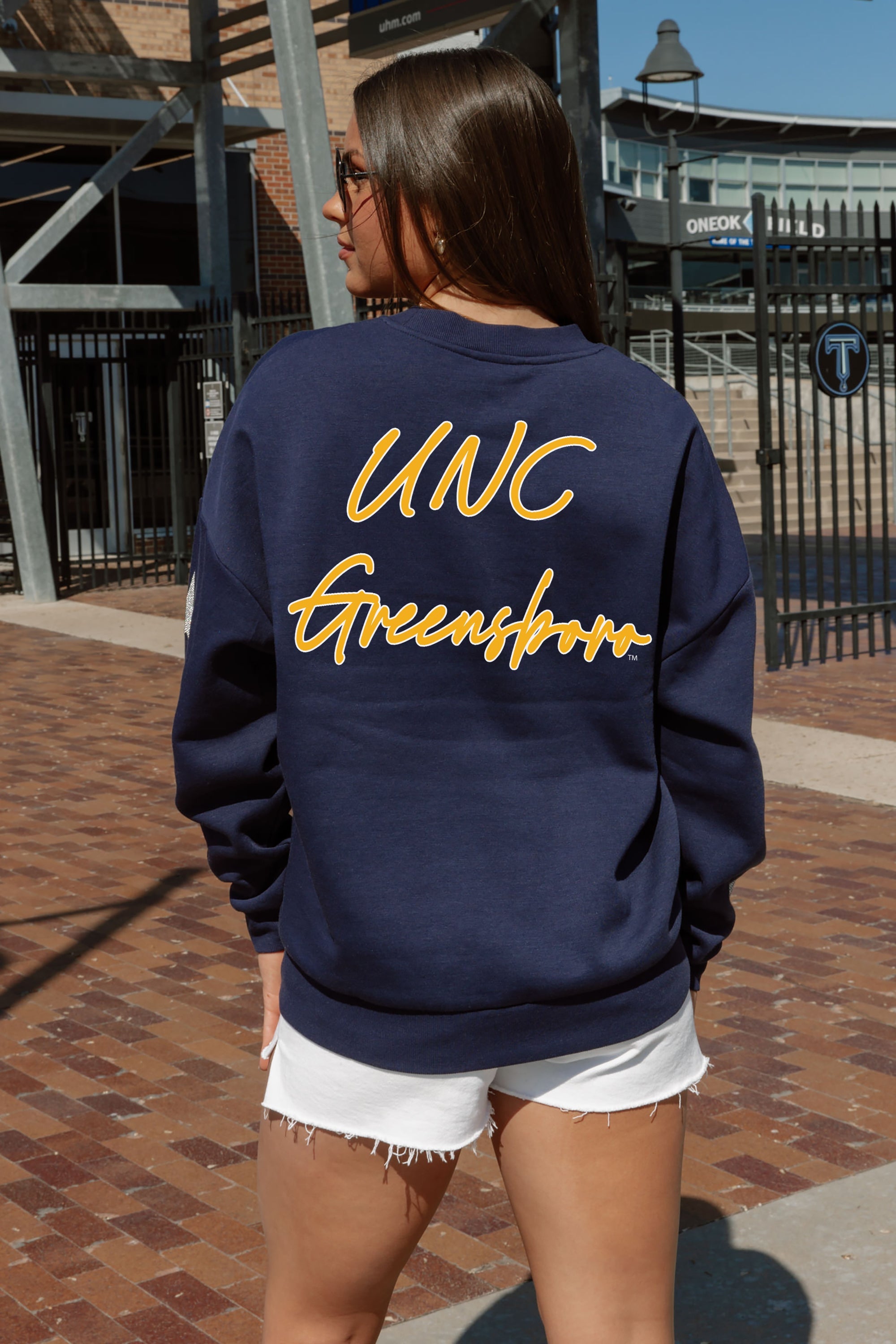 UNC GREENSBORO SPARTANS DEDICATION EMBELLISHED STAR SLEEVE CREWNECK PULLOVER