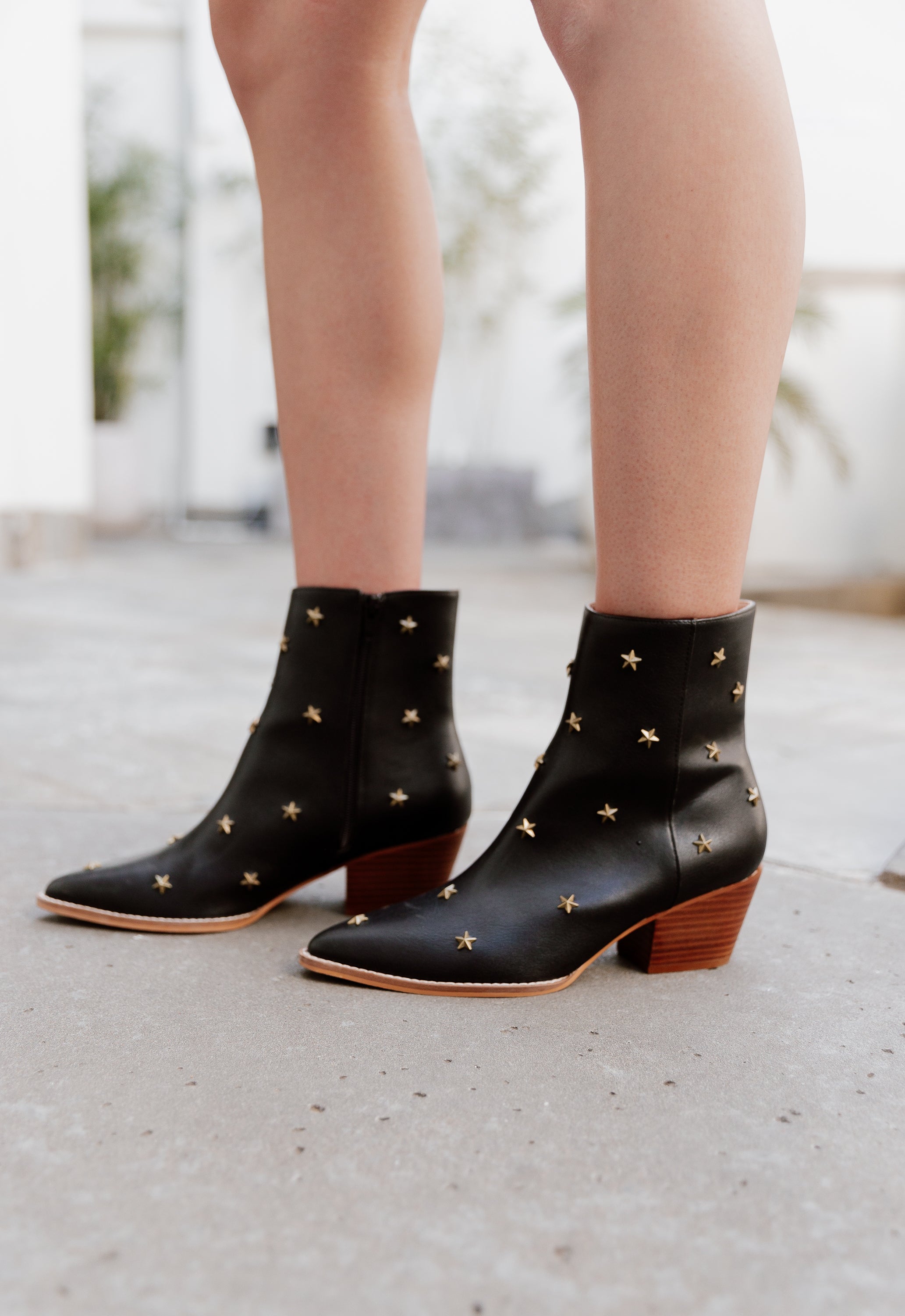 STRIDE IN STUDDED BOOTS IN BLACK