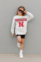 NEBRASKA CORNHUSKERS BIG GOALS KIDS DROP SHOULDER LONG SLEEVE TEE WITH RIBBED NECKLINE AND CUFFS