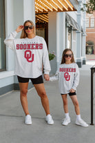 OKLAHOMA SOONERS BIG GOALS KIDS DROP SHOULDER LONG SLEEVE TEE WITH RIBBED NECKLINE AND CUFFS