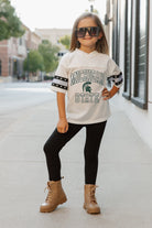 MICHIGAN STATE SPARTANS A STEP AHEAD KIDS OVERSIZED V-NECK RHINESTONE-STRIPED TRIM FASHION JERSEY