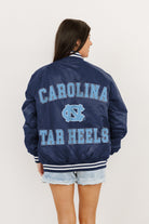 NORTH CAROLINA TAR HEELS CHAMPION'S CLUB SPORT STRIPE VARSITY JACKET BY MADI PREWETT TROUTT