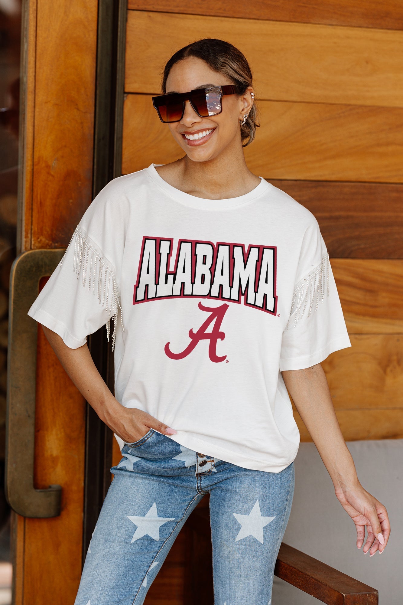 ALABAMA CRIMSON TIDE IRRESISTIBLE SHORT SLEEVE RHINESTONE FRINGE TEE WITH RIBBED NECKLINE