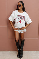 ALABAMA CRIMSON TIDE IRRESISTIBLE SHORT SLEEVE RHINESTONE FRINGE TEE WITH RIBBED NECKLINE