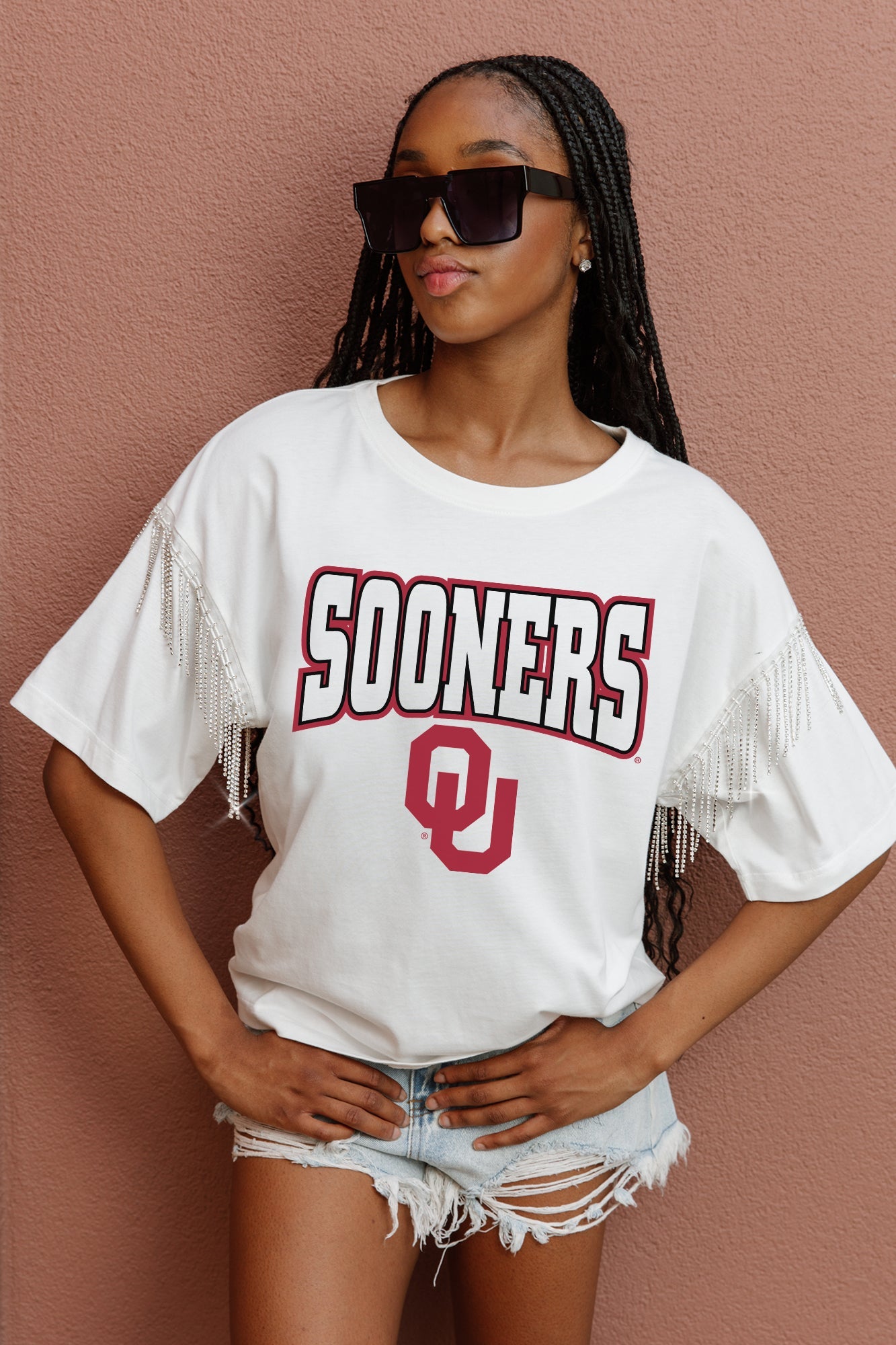 OKLAHOMA SOONERS IRRESISTIBLE SHORT SLEEVE RHINESTONE FRINGE TEE WITH RIBBED NECKLINE