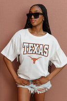 TEXAS LONGHORNS IRRESISTIBLE SHORT SLEEVE RHINESTONE FRINGE TEE WITH RIBBED NECKLINE