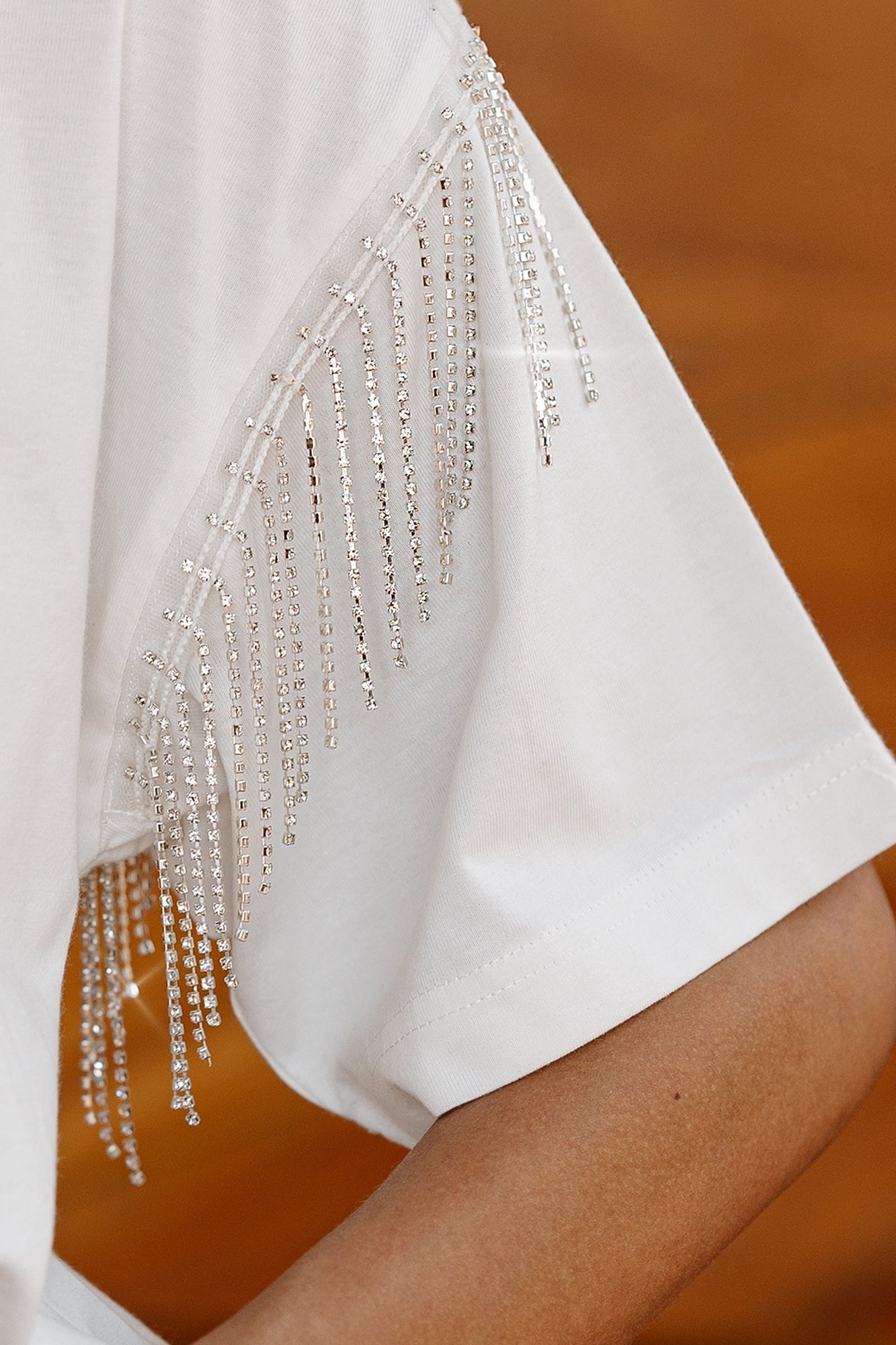 TEXAS LONGHORNS IRRESISTIBLE SHORT SLEEVE RHINESTONE FRINGE TEE WITH RIBBED NECKLINE