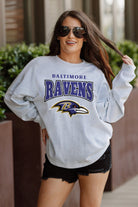 BALTIMORE RAVENS FIGHTING SPIRIT RELAXED FIT HEATHERED LONG SLEEVE FRENCH TERRY PULLOVER