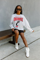 CINCINNATI BEARCATS FIGHTING SPIRIT DROP SHOULDER LONG SLEEVE TEE WITH RIBBED NECKLINE AND CUFFS