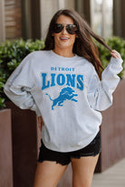 DETROIT LIONS FIGHTING SPIRIT RELAXED FIT HEATHERED LONG SLEEVE FRENCH TERRY PULLOVER