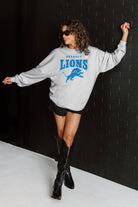 DETROIT LIONS FIGHTING SPIRIT RELAXED FIT HEATHERED LONG SLEEVE FRENCH TERRY PULLOVER