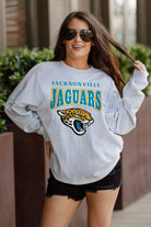 JACKSONVILLE JAGUARS FIGHTING SPIRIT RELAXED FIT HEATHERED LONG SLEEVE FRENCH TERRY PULLOVER