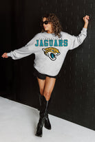 JACKSONVILLE JAGUARS BIG GOALS RELAXED FIT HEATHERED LONG SLEEVE FRENCH TERRY PULLOVER