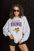 MINNESOTA VIKINGS FIGHTING SPIRIT RELAXED FIT HEATHERED LONG SLEEVE FRENCH TERRY PULLOVER