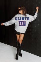 NEW YORK GIANTS BIG GOALS RELAXED FIT HEATHERED LONG SLEEVE FRENCH TERRY PULLOVER