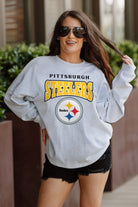 PITTSBURGH STEELERS FIGHTING SPIRIT RELAXED FIT HEATHERED LONG SLEEVE FRENCH TERRY PULLOVER