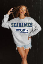 SEATTLE SEAHAWKS BIG GOALS RELAXED FIT HEATHERED LONG SLEEVE FRENCH TERRY PULLOVER