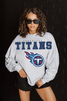 TENNESSEE TITANS BIG GOALS RELAXED FIT HEATHERED LONG SLEEVE FRENCH TERRY PULLOVER