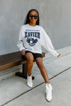 XAVIER MUSKETEERS FIGHTING SPIRIT DROP SHOULDER LONG SLEEVE TEE WITH RIBBED NECKLINE AND CUFFS