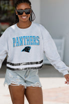 CAROLINA PANTHERS PASS THE SHINE LONG SLEEVE METALLIC SHIMMER-STRIPE TOP