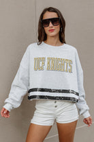 CENTRAL FLORIDA KNIGHTS PASS THE SHINE LONG SLEEVE METALLIC SHIMMER-STRIPE TOP WITH RIBBED NECKLINE AND CUFFS