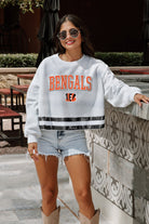 CINCINNATI BENGALS PASS THE SHINE LONG SLEEVE METALLIC SHIMMER-STRIPE TOP