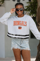 CINCINNATI BENGALS PASS THE SHINE LONG SLEEVE METALLIC SHIMMER-STRIPE TOP