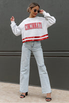 CINCINNATI BEARCATS PASS THE SHINE LONG SLEEVE METALLIC SHIMMER-STRIPE TOP WITH RIBBED NECKLINE AND CUFFS