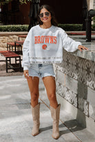 CLEVELAND BROWNS PASS THE SHINE LONG SLEEVE METALLIC SHIMMER-STRIPE TOP