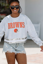 CLEVELAND BROWNS PASS THE SHINE LONG SLEEVE METALLIC SHIMMER-STRIPE TOP