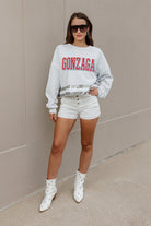 GONZAGA BULLDOGS PASS THE SHINE LONG SLEEVE METALLIC SHIMMER-STRIPE TOP WITH RIBBED NECKLINE AND CUFFS