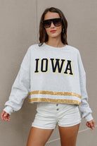 IOWA HAWKEYES PASS THE SHINE LONG SLEEVE METALLIC SHIMMER-STRIPE TOP WITH RIBBED NECKLINE AND CUFFS