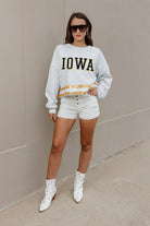 IOWA HAWKEYES PASS THE SHINE LONG SLEEVE METALLIC SHIMMER-STRIPE TOP WITH RIBBED NECKLINE AND CUFFS