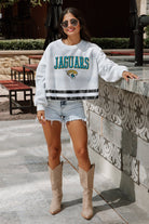 JACKSONVILLE JAGUARS PASS THE SHINE LONG SLEEVE METALLIC SHIMMER-STRIPE TOP