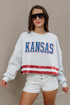 KANSAS JAYHAWKS PASS THE SHINE LONG SLEEVE METALLIC SHIMMER-STRIPE TOP WITH RIBBED NECKLINE AND CUFFS