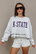 KANSAS STATE WILDCATS PASS THE SHINE LONG SLEEVE METALLIC SHIMMER-STRIPE TOP WITH RIBBED NECKLINE AND CUFFS