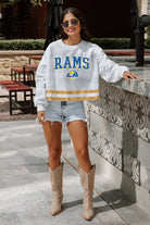 LOS ANGELES RAMS PASS THE SHINE LONG SLEEVE METALLIC SHIMMER-STRIPE TOP