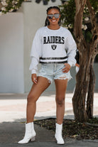 LAS VEGAS RAIDERS PASS THE SHINE LONG SLEEVE METALLIC SHIMMER-STRIPE TOP