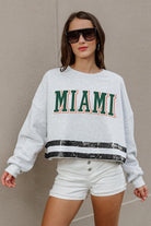 MIAMI HURRICANES PASS THE SHINE LONG SLEEVE METALLIC SHIMMER-STRIPE TOP WITH RIBBED NECKLINE AND CUFFS