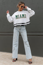 MIAMI HURRICANES PASS THE SHINE LONG SLEEVE METALLIC SHIMMER-STRIPE TOP WITH RIBBED NECKLINE AND CUFFS