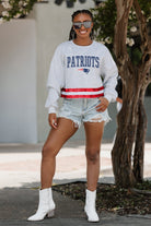 NEW ENGLAND PATRIOTS PASS THE SHINE LONG SLEEVE METALLIC SHIMMER-STRIPE TOP