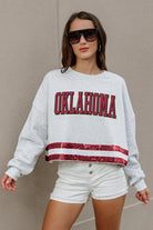 OKLAHOMA SOONERS PASS THE SHINE LONG SLEEVE METALLIC SHIMMER-STRIPE TOP WITH RIBBED NECKLINE AND CUFFS