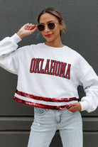 OKLAHOMA SOONERS PASS THE SHINE LONG SLEEVE METALLIC SHIMMER-STRIPE TOP WITH RIBBED NECKLINE AND CUFFS