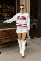 OKLAHOMA SOONERS PASS THE SHINE LONG SLEEVE METALLIC SHIMMER-STRIPE TOP WITH RIBBED NECKLINE AND CUFFS