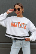 OKLAHOMA STATE COWBOYS PASS THE SHINE LONG SLEEVE METALLIC SHIMMER-STRIPE TOP WITH RIBBED NECKLINE AND CUFFS