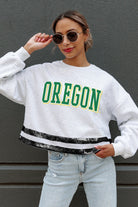 OREGON DUCKS PASS THE SHINE LONG SLEEVE METALLIC SHIMMER-STRIPE TOP WITH RIBBED NECKLINE AND CUFFS