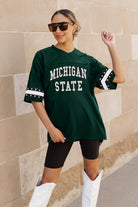 MICHIGAN STATE SPARTANS UNTIL KICKOFF OVERSIZED V-NECK RHINESTONE-STRIPED TRIM FASHION JERSEY