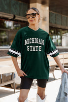 MICHIGAN STATE SPARTANS UNTIL KICKOFF OVERSIZED V-NECK RHINESTONE-STRIPED TRIM FASHION JERSEY